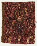 Textile fragment featuring an anthropomorphic figure