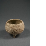 Tripod vessel with incised decoration
