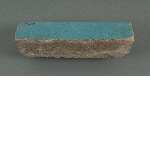 Brick with monochrome opaque glaze
