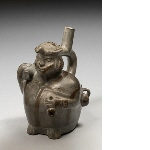 Vessel in the shape of a dignitary with bird hat